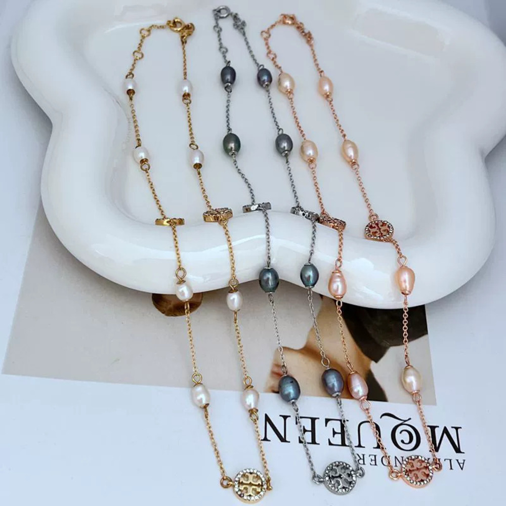 Tory Burch Natural Pearl Rhinestone Round Hollow Initial Necklace for